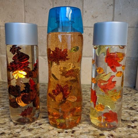 Autumn Leaves Sensory Bottles - Three Ways - Tea in the Wild Leaves Sensory, Sensory Bottles For Toddlers, Snow Sensory, Sensory Bottles Preschool, Glitter Sensory Bottles, Leaf Confetti, Sensory Bottle, Halloween Sensory, Fall Preschool Activities