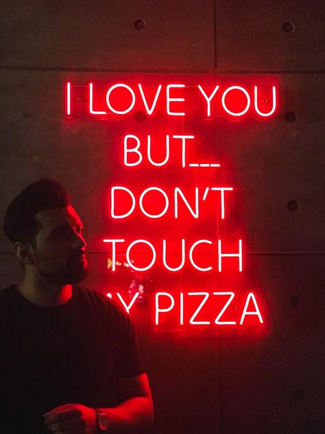 A neon red text about pizza.
"I love you but dont touch my pizza" Pizzeria Neon Sign, Neon Pizza Sign, Pizza Restaurant Interior, Neon Pizza, Pizza Restaurant Design Interior Ideas, Pizza Neon Sign, Indian Pizza, Pizza Quotes, Pizza Store