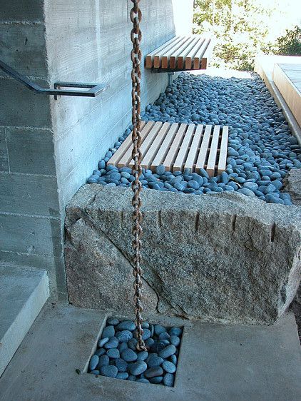 Rain Chain Detail | Making Space and Place Gutter Chains, Rock River, Rain Gutters, Rain Chain, Rain Barrel, Door Designs, Rain Water Collection, Rain Garden, Landscaping With Rocks