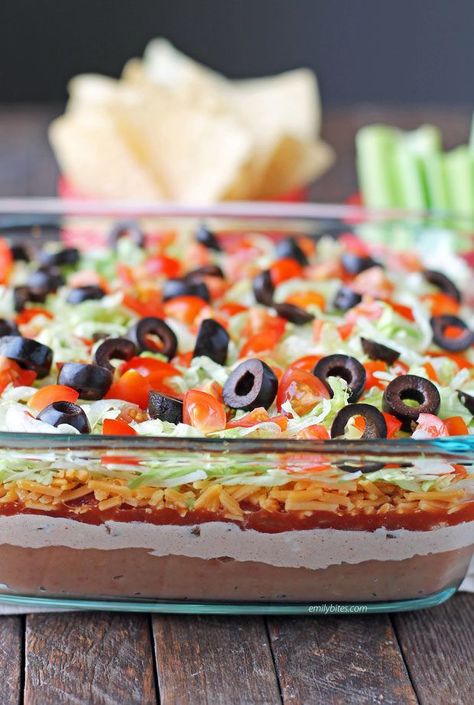 This easy 7 Layer Dip is perfect for parties and potlucks, no oven required! Layers of Mexican flavor, just 111 calories or 2 WW Freestyle SmartPoints. www.emilybites.com Salad Dip Recipe, Taco Salad Dip, Layered Taco Salads, Salad Dip, Culinary Basics, 7 Layer Dip Recipe, Layered Taco, Layered Dip Recipes, Layered Bean Dip