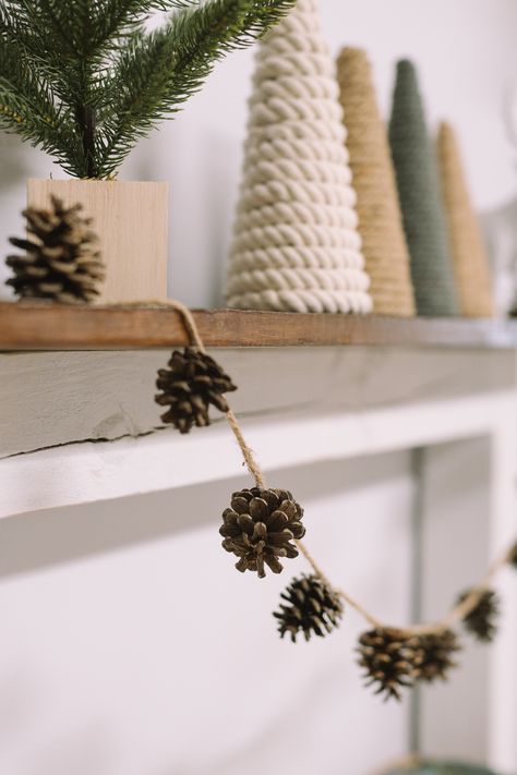 Pinecone Decor Christmas, Pinecones Crafts Christmas, Diy Pinecones For Christmas, How To Make Pinecone Garland, Garland With Pinecones, Winter Pinecone Decor, Diy Eco Christmas Decorations, Basket Of Pinecones Decor, Decorating With Pinecones For Christmas