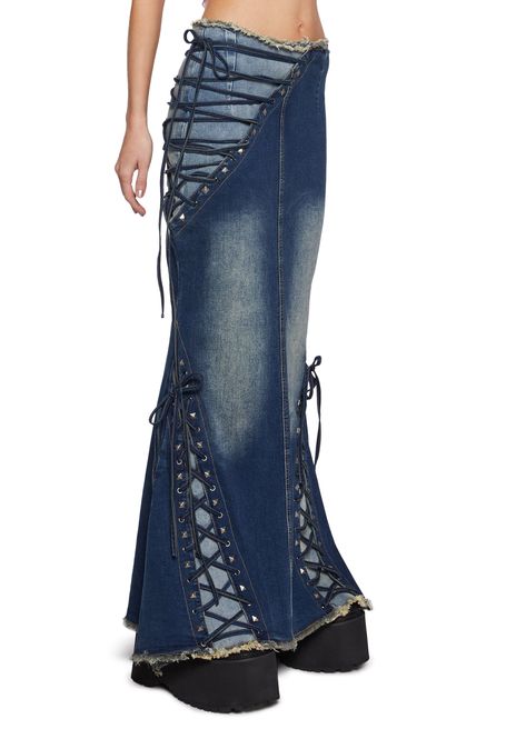 This maxi skirt has a washed denim construction with a distressed waist and hem, pyramid stud detailing, a lace design on the front and sides, a back slit, and a side zipper closure. Current Mood Clothing, Butterfly Costume, Current Mood, Washed Denim, Lace Design, Dolls Kill, Exclusive Collection, Denim Wash, Pyramid