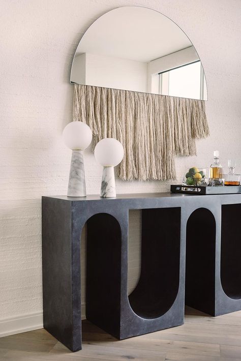 Modern Console Table, Mirror On The Wall, Modern Console, A Mirror, A Black, Console Table, The Wall, A Table, Lamps