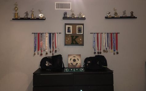 Collection of trophies, medals, and pins from soccer Soccer Medals, Trophy Wall, Soccer Trophy, Soccer Stuff, Soccer Poster, Sport Soccer, Soccer, Wall, Pins