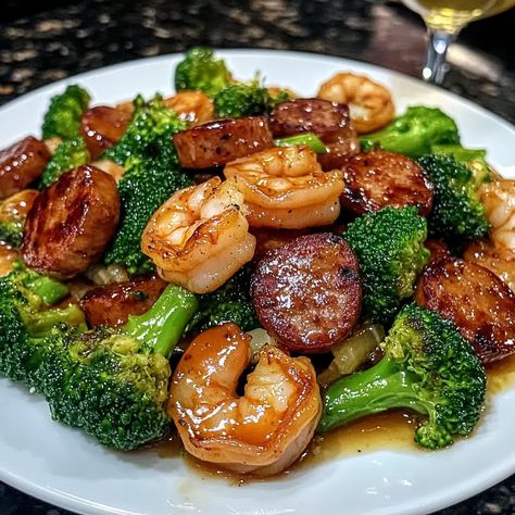 Honey Garlic Shrimp Sausage and Broccoli Honey Garlic Shrimp And Broccoli Recipe, Honey Shrimp Sausage And Broccoli, Shrimp Broccoli Foil Packets, One Pot Garlicky Shrimp And Broccoli, Shrimp Dinner Ideas Low Carb, Shrimp And Kabasa Recipes, Shrimp And Sausage Sheet Pan Dinner, Simple Family Dinners Healthy, Shrimp Recipes With Potatoes