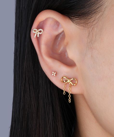 Three piercings, one perfect ear stack—how cute is this look? 🎀 🌸 Get 60% off sitewide! 💕 #oumojewelry #earpiercing #earstyling #earrings Three Piercings Ears, Three Piercings, Ear Style, Ear Stack, Flower Stud, Delicate Earrings, Flower Studs, Layered Look, Earings Piercings