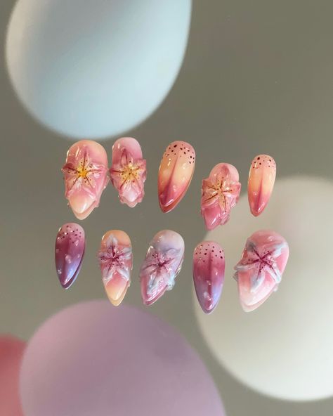 Lilies field 𓍢ִ໋🌸ᰔᩚ 🔷 custom press-ons, medium length, almond-stiletto shaped 🔷Time to step into summer elegance with my custom press-ons: Lilies Field!💖 These medium-length almond-stiletto nails are inspired by the delicate beauty of lilies, perfect for adding a touch of floral charm to your style. Embrace the art of nature at your fingertips. • • • #nailartist #lilies #flowernails #paris16 #nails #gelnails #almondnails #pressonnails #nailart #naildesign #nailspiration #gel #gelxnails #3dflo... Lilies Nails, Lotus Flower Nails, Delicate Nails, Gell Nails, Almond Stiletto, Lily Nails, Tiny Office, Art Of Nature, Nail Store