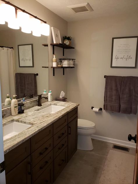 Tan Small Bathroom Ideas, Brown Cabinets Bathroom Decor, Brown And Beige Bathroom Ideas, Bathroom Decor Earth Tones, Dark Cabinet Bathroom Decor, Brown Neutral Bathroom, Bathroom Brown Cabinets Decor, Bathroom Decor Dark Brown Cabinets, Dark Brown Bathroom Decor