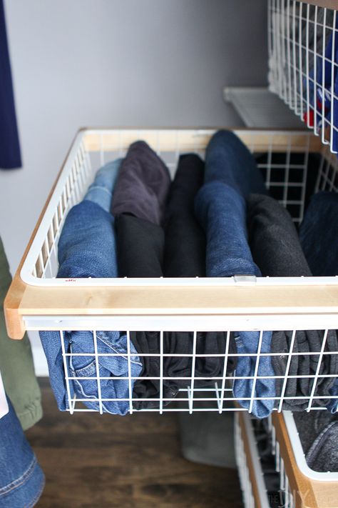 Storing jeans in a wire basket in the closet. I decided to overhaul my drawers with the Marie Kondo fold. Here's the step-by-step process to get your sweaters and jeans folded perfectly! #mariekondo #tidyingup #konmari #folding #organization #organized #organizedcloset Organisation, Jean Organization Drawers, How To Store Jeans In Drawer, Store Jeans In Closet, Best Way To Store Jeans, How To Store Jeans, Organize Jeans In Closet, Jean Storage, Storing Jeans