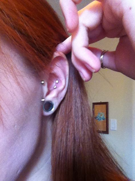 2 Conch piercings, vertical tragus surface piercing or "sideburn", 00g stretched ears.  Red hair :) 0g Stretched Ears Aesthetic, 10mm Stretched Ears, Stretched Ears 00g, 00g Stretched Ears, Small Stretched Ears, Stretched Ear Lobes, Conch Piercings, Surface Piercing, Stretched Lobes