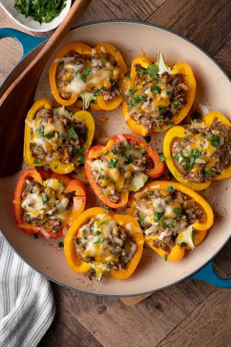 Bison Stuffed Peppers are the robust, flavorful cousin to traditional ground beef stuffed peppers. This flavor-packed recipe with a simple, quick tomato sauce will spice up your dinner routine. Bison Stuffed Peppers, Stuffed Bell Peppers With Boudin, Smoked Stuffed Bell Peppers, Ground Beef Stuffed Peppers, Southwestern Stuffed Peppers, Beef Stuffed Peppers, We Stuffed Peppers, Quick Tomato Sauce, Stuffed Peppers Beef