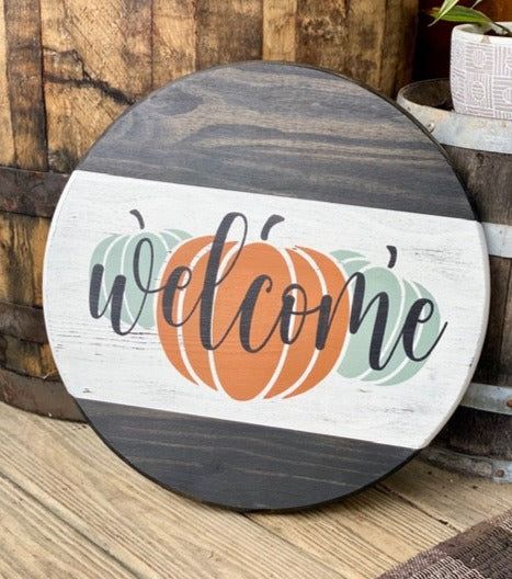 Sign Reads: Welcome with 3 pumpkins Hand Painted, 16" Round Wood Sign, Custom Made Welcome to my shop. If you like hand-painted custom pieces you have come to the right place. My love of painting and design has led me to open my own shop to share my talent with you. Each item is handmade and painted by me. I ship within 10-14 days from receipt of order. This does not include shipping time. Each sign is custom made, so extra time is needed to produce quality signs. All signs are wood. Details: Se Easy Holiday Wood Projects, Fall Door Signs Wooden, Circle Fall Signs, Hello Fall Round Wood Sign, Wooden Pumpkin Sign, Fall Wood Porch Signs, Holiday Circle Wood Signs, Fall Round Door Signs, Halloween Wood Door Signs