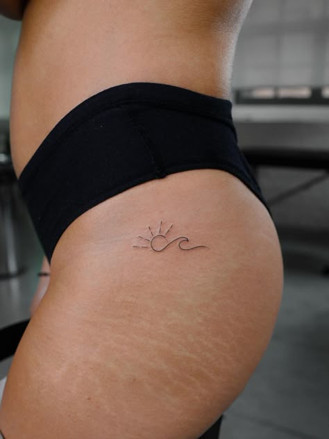 55 Meaningful Fine Line Tattoos for Minimalist Women Fine Line Woman Tattoo, Sun And Wave Tattoo, Lifeline Tattoos, Tattoo Leo, Side Hip Tattoos, International Tattoo, Cowgirl Tattoos, Tattoos Infinity, Sister Tattoo