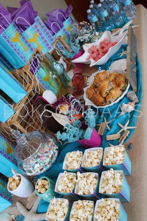 Mermaid Food Table Ideas, Mermaid Party Sweets Table, Under The Sea Snack Table, Mermaid Sweets Table Ideas, Mermaid Party Set Up, Little Mermaid Desert Table, Little Mermaid Pool Birthday Party, Mermaid Party Cake Table, Under The Sea Table Setting