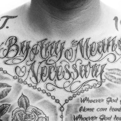 Tattoo uploaded by Tattoodo | #chestpiece #script #blackandgrey #lettering | 3074 | Tattoodo By Any Means Necessary Tattoo, Rise Tattoo, Letter Tattoos, Lettering Tattoos, Any Means Necessary, Chicano Style Tattoo, Facial Tattoos, By Any Means Necessary, Tattoo Script