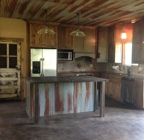 Rustic kitchen with old door for pantry door, custom made island, tin ceiling. Rustic Kitchen Island, Rustic Kitchen Cabinets, Farmhouse Kitchen Cabinets, Kitchen Decorating, Farmhouse Kitchen Decor, Counter Top, Barn House, Rustic Furniture, Rustic Kitchen