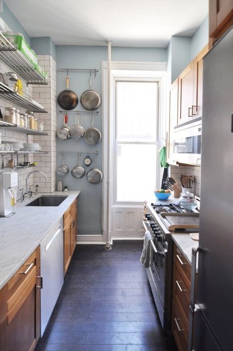 well arranged galley kitchen w/ mic of closed wood cabinets and open steel shelves, pans hanging on a narrow wall, would change the marble counter, maybe apaint the wood cabinets Galley Kitchen Remodel Ideas, Kitchen Spotlights, Small Galley Kitchen, Brooklyn Kitchen, Galley Kitchen Remodel, Galley Kitchens, Kitchen Stand, Galley Kitchen, 아파트 인테리어