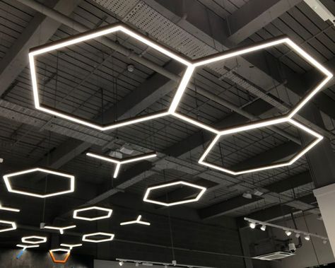 Our Hex and Y luminaires are a firm favourite. Manufactued in-house using our Tron Linear, the possibilities are endless!  #ThrowbackThursday   @KidsCavern @intuTrafford Open Ceiling Lighting, Gym Lighting Ideas, Gym Lights, Trafford Centre Manchester, Smart Factory, Trafford Centre, Gym Lighting, Space Art Gallery, Grocery Store Design