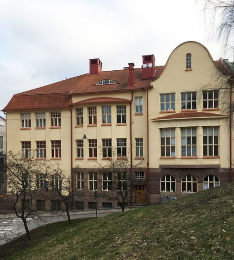 Swedish Co-educational School · Finnish Architecture Navigator Finnish Architecture, School Outside, Human Environment, Facade Material, Mansard Roof, Grey Granite, Granite Stone, School Building, Yellow Painting