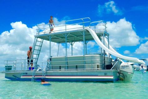 What better way to get away from routine life than to cruise on the water in a double-decker pontoon boat with your loved ones? Double-decker pontoons are also referred to as Funships. This name could be attributed to the slide attached to the secondary upper deck of most double-decker pontoons. The term was initially introduced […] Double Decker Pontoon Boat, Pontoon Boat With Slide, Pontoon Remodel, Pontoon Anchor, Premier Pontoon, Cabin Fun, Diving Lessons, Houseboat Rentals, Party Barge