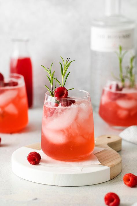 This Raspberry Gin Cocktail is the perfect sweet and fruity drink for Valentine’s day. This refreshing cocktail is made with two types of liquor, fresh lemon, and a refined sugar-free raspberry simple syrup! Gin Lemon Cocktail, Raspberry Gin Cocktail, Raspberry Simple Syrup, Types Of Liquor, Easy Gin Cocktails, Kitchen Website, Raspberry Gin, Raspberry Cocktail, Lexi's Clean Kitchen