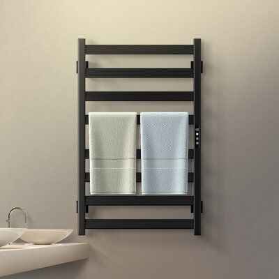 Adding a heated towel bar is one that can turn your everyday shower into a luxurious experience. Our 8-Bar Towel Warmer is your best option, on account of its reasonable price tag, modern design, and undeniably sleek appearance. Once installed, you can just plug it into an outlet and enjoy toasty textiles in as little as 3-5 minutes. In addition to heating your bath sheets, our Warmer prevents fabrics from developing that dreaded musty smell and ultimately reduces how often you have to wash your Shower Towel Storage, Towel Warmer Rack Bathroom, Black Towel Warmer, Towel Warmer Bathroom Wall Mount, Modern Bathroom Towel Rack Ideas, Towel Warmer Bathroom, Heated Towel Racks Bathroom, Masterbath Ideas, Heated Towel Racks