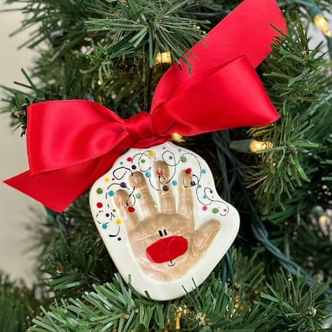 Reindeer Clay Ornament - Sugarplum Christmas craft ideas #christmascraftideas Christmas craft idea #christmascraftidea #christmas #craft #idea merry christmas #merrychristmas 4.80 Kid Clay Christmas Ornaments, Reindeer Ornaments Handprint, Hand Print Clay Ornaments, Reindeer Clay Ornaments, Santa Hand Print Ornament, Toddler Clay Ornaments, Salt Dough Hand Ornaments, Baby Hand Ornament, Kids Clay Christmas Ornaments