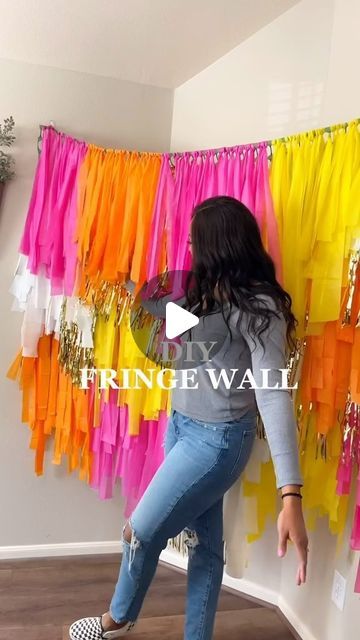 Deja Smith on Instagram: "While I’m sharing her 3rd birthday party…Let’s throw it back to my daughter’s 2nd birthday to show you one of my favorite DIY’s!  These fringe back drops are such a fun staple piece and truly so easy, just a bit tedious. But I’d just stay up late, pour a glass of wine and turn on my fav tv show for a bit and go to work on this backdrop   The best part, it’s reusable! I still have it so I can keep using for other events and even left my friends borrow it if they want!  Maybe next party, I’ll do another!  . . #diymom #pinterestmom #twogroovy #diybackdrop #fringebackdrop #diyfringewall #toddlermom #momcontent #motherhood #relatablemom #craftymom #partydiy #partyproject #toddlerbirthday #toddlerparty #backdropideas #partybackdrop #photoprops #photobackdrop #diymama #n Diy Photo Backdrop Tablecloth, How To Build A Birthday Backdrop, Barbie Fringe Backdrop, Reusable Backdrop Ideas, Round Fringe Backdrop, Making A Backdrop Diy, Fringe Background Diy, Butterfly Backdrop Diy, Diy Ribbon Backdrop