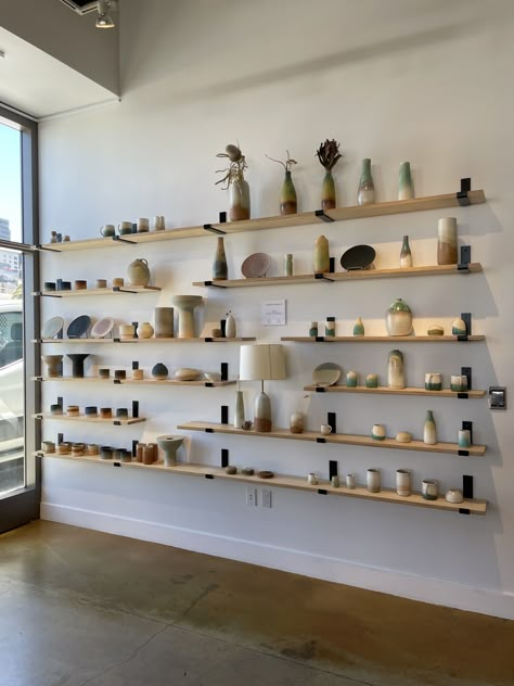 Ceramic Window Display, Pottery Shelf Display, Retail Wall Shelving, Ceramic Store Interior Design, Ceramic Display Shelves, Ceramic Shop Display, Ceramic Collection Display, Pottery Shop Display, Pottery Gallery Display