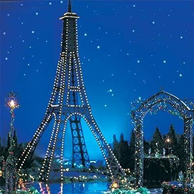 Paris! This giant, lighted Eiffel Tower will be the centerpiece to your romantic evening. The tower is constructed with sturdy black cardboard, clear mini lights and measures 17'2" high x 8'6" diameter. This kit has a 6' archway, so once fully constructed most individuals can walk underneath it. The height on the tower can be decreased by up to 48". This large Eiffel Tower is a grand addition to your wedding, Prom, Homecoming dance, gala, recital, play, and more Cardboard Eiffel Tower, Around The World Prom Theme, Paris Prom Theme, Homecoming Dance Themes, Eiffel Tower Decor, Paris Invitations, Eiffel Tower Decorations, Prom Themes, Paris Theme Party