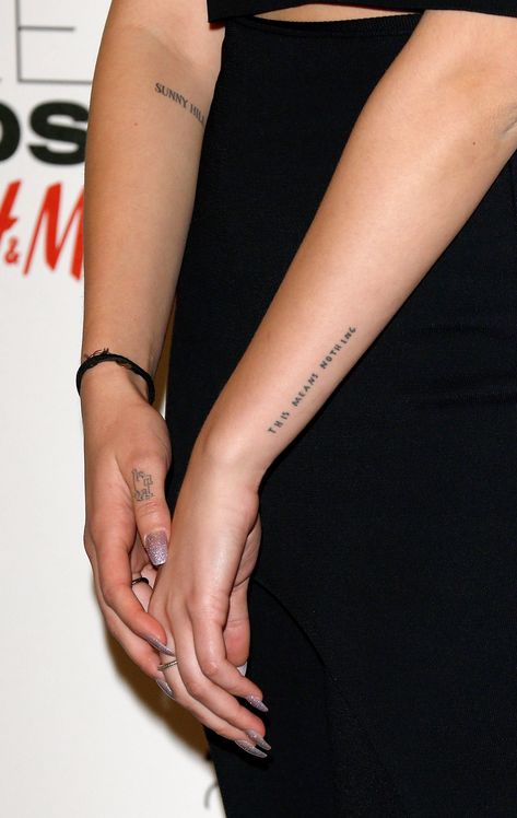 Dua Lipa's "This Means Nothing." Tattoo Tattoos With Beautiful Meaning, Dua Lipa Tattoo, Patience Tattoo, No Tattoo, Words Tattoo, Font Tato, Wörter Tattoos, Red Tattoos, Classy Tattoos