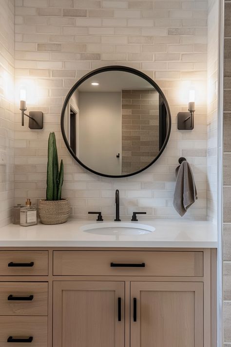 Get inspired by this modern guest bathroom that beautifully blends rustic and farmhouse vibes. Perfect for a tiny powder room or downstairs bathroom, this space shows how small rooms can make a big impact. With sleek black fixtures and wood accents, the furniture adds to the charm of this bathroom cottage design. Whether you're planning a remodel or redesign, this calming washroom offers the perfect balance of style and functionality for any house. Clean Bathroom Inspiration, Small Bathroom Ideas With Black Accents, Bathroom Decor With Shiplap, Mens Half Bathroom Ideas, Bathroom Remodel With Black Fixtures, Guest Bathroom Before And After, Half Bathroom Modern Farmhouse, Modern Beach Cottage Bathroom, Light Colored Small Bathrooms