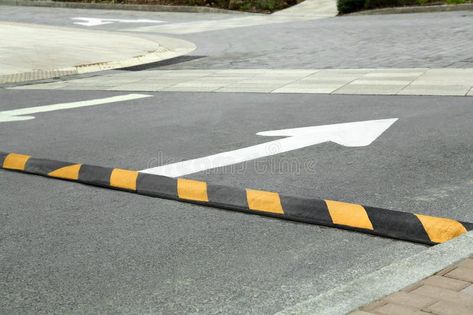 Striped speed bump on street. Road safety royalty free stock photo Street Image, Speed Bump, Road Safety, Traffic Light, Street Photo, Bump, Finance, Royalty Free Stock Photos, Royalty