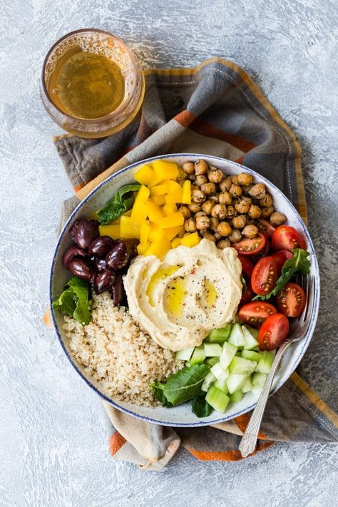 This easy Mediterranean Buddha Bowl is full of colorful veggies, nutritious quinoa, and roasted chickpeas. Top with hummus for an epic power lunch! Hummus Bowl Vegan, Greek Budda Bowls, Brisket Bowl, Buda Bowl, Colorful Meals, Glow Bowl, Macro Bowl, Mediterranean Bowl, Bliss Bowls