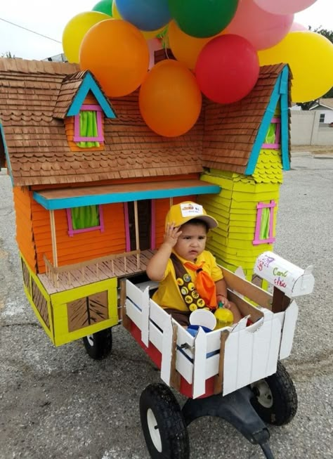 16 Wagon Halloween Costume Ideas Kids Wagon Float Ideas, Halloween Stroller Decoration, Baby Parade Float Ideas, Family Halloween Costumes With Wagon, Halloween Wagon Decor, Wagon Decorations For Halloween, Veer Wagon Halloween, Diy Wagon Halloween Costume, Wagon Parade Float Ideas Kids