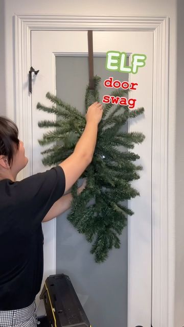 How To Make A Swag Out Of Garland, Diy Grinch Wreaths For Front Door, Front Door Christmas Decorations Diy, Grinch Door Wreath, Front Door Christmas Swag, Swag Decorating Ideas, Winter Door Swag, Wearths Ideas Doors, Christmas Front Door Decor Ideas