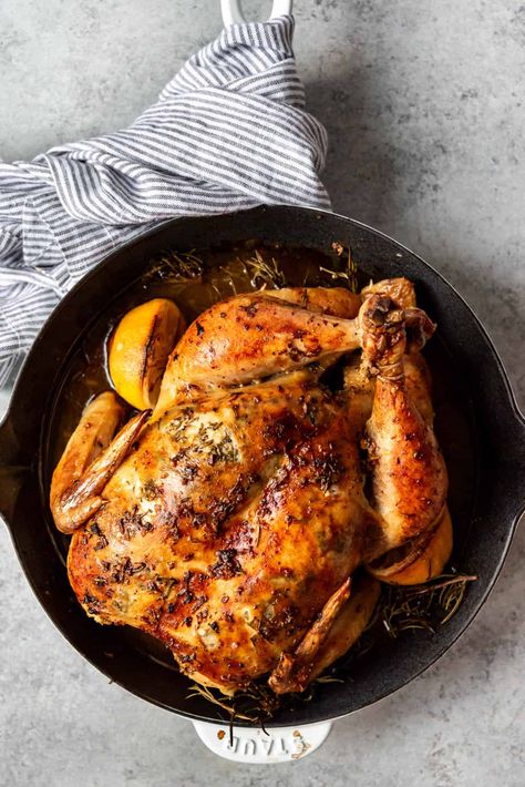 Slow Roasted Chicken slathered in garlic butter is a must for special occasions like Easter! This easy whole roast chicken recipe is absolutely fail-proof with my step-by-step instructions, and ready in 1-2 hours, depending on the size of your chicken. The whole family will love this juicy, tender roasted whole chicken recipe! #best #chicken #roasted #roast #whole #easy #lemon #garlic Slow Roasted Chicken, Best Roast Chicken Recipe, Whole Roast Chicken Recipe, Roasted Whole Chicken, Whole Roast Chicken, Whole Chicken Recipe, Whole Baked Chicken, Best Roasted Chicken, Roasted Chicken Recipe