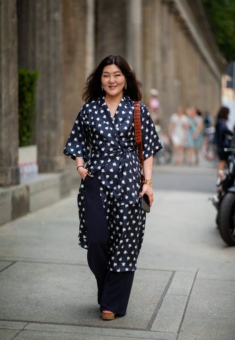 Wrap Dress With Pants, Wrap Dress 2023, Wrap Dress Layering Outfit, Dress Over Pants Street Style, Wrap Dress Boots, Wrap Dress Street Style, Dress Over Pants Outfits, Wrap Dress Outfit Casual, Dress With Pants Underneath