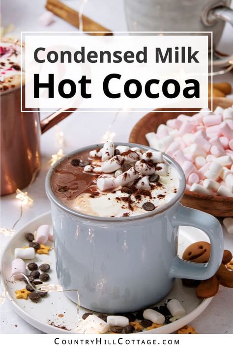 Condensed milk hot chocolate is the sweetest and creamiest way to warm up this winter! Made with 5 ingredients, the recipe is a twist on traditional hot cocoa, perfect to cozy up during the holidays and colder months. Thanks to condensed milk and cocoa powder, this drink has a rich chocolate flavor and thick, dreamy texture. Top your hot cocoa with marshmallows, chocolate chips, cinnamon, hot fudge sauce, cookies, peppermint, peanut butter, Biscoff and white chocolate. | CountryHillCottage.com Hot Cocoa With Almond Milk, Condensed Milk Hot Chocolate, Condensed Milk And Cocoa Powder, Chocolate With Cocoa Powder, Mint Hot Chocolate Recipe, Gourmet Drinks, Hot Chocolate With Cocoa Powder, Cookies Peppermint, Hot Chocolate Toppings