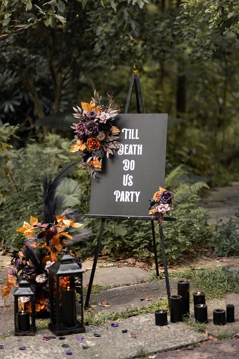 DetailsFlower Sign Decor boasts a flexible base with reusable zip ties & metal clips, easily securing to wedding signs, chairs, etc. Its artificial blooms mimic real flowers, staying vibrant all day, a cost-effective alternative to fresh flowers. Ready to use, it adapts to various arch shapes. Note: Gently reshape petals if bent during shipping. SizeThe large flower swag design measures about 15"-20" long and 7" wide, the small flower tie measures 7" long and 5" wide. They are purely handmad Black And Plum Wedding Cake, Outdoor Halloween Wedding Decorations, Red Black And White Rustic Wedding, Modern Goth Wedding Decor, Black And Mulberry Wedding, Small Black Wedding Ideas, Dark Wedding Signs, Black And Wood Wedding Decor, Black Purple Orange Halloween Wedding