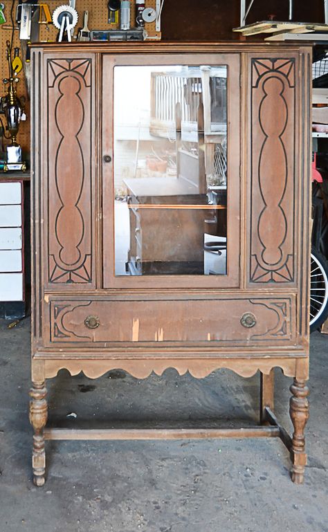 If you have a china cabinet that is in need of a makeover, click over to see how easy it was to transform this china cabinet to make it more relevant and less dingy. 1950s China Cabinet, How To Repurpose A China Cabinet, Jacobean China Cabinet Makeover, Refurbished Antique China Cabinet, Refinished Antique China Cabinet, Other Uses For China Cabinets, Painting An Old China Cabinet, Restored China Cabinet, Painted Vintage China Cabinet