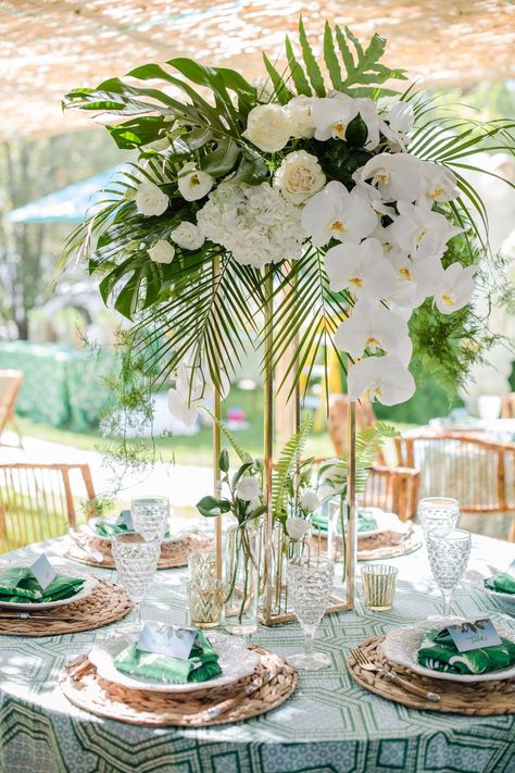 Tropical Wedding Centerpieces Palms, Tropical Wedding Centrepiece, Tropical Glam Wedding Flowers, Orchid And Palm Centerpiece, Roses And Palm Leaves, Tropical Ballroom Wedding, Upscale Tropical Wedding, White Flowers With Palm Leaves, Tropical Glamour Wedding