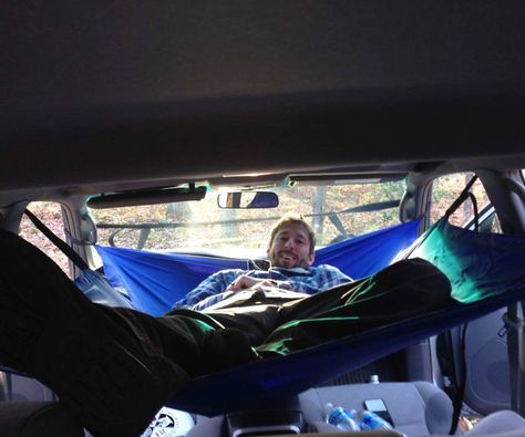 This in-cabin car hammock transforms your trusty ride into the ideal location for a relaxing nap. It works on all kinds of makes and models and features a convenient system of hooks, straps, and buckles that allow you to securely attach it using your car’s doors. Suv Hammock, Truck Bed Hammock, Hammock In Trailer, Jeep Hammock, Car Hammock, Car Camping Organization, Truck Hitch, Backpacking Hammock, Camp Lake