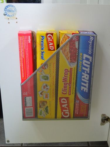 Get plastic wrap and aluminum foil out of the way by stowing them in a well-hidden magazine file. Small Kitchen Cabinet Storage, Smart Tiles, Small Kitchen Storage, Storage Hacks, Tiny Kitchen, Door Storage, Cabinet Door, Cleaning Organizing, Small Apartments