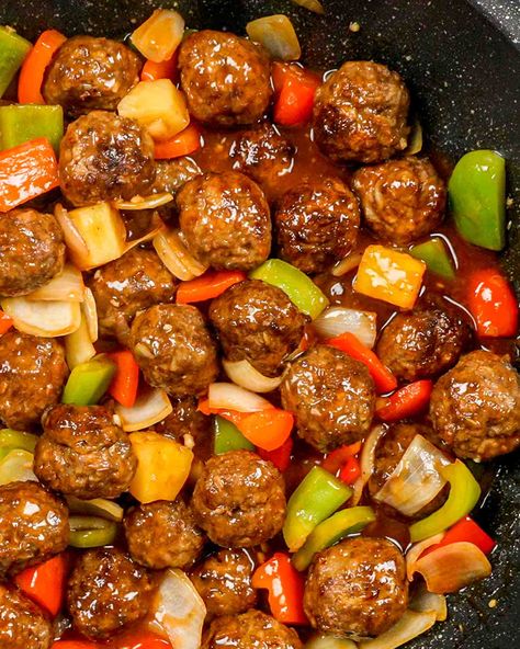 Tossed together with sweet pineapple and stir-fried veggies, these tasty quick and easy Sweet and Sour Meatballs can be baked or air fried! #sweetandsour #meatballs #recipe Sweet And Sour Hamburger, Sweet A D Sour Meatballs, Sweet And Sour Meatballs And Rice, Flavored Meatball Recipes, Flavorful Dinner Ideas, Meatball And Peppers, Sweet And Sour Meatballs Freezer Meal, Healthy Ground Deer Recipes, Low Carb Dinner For 2