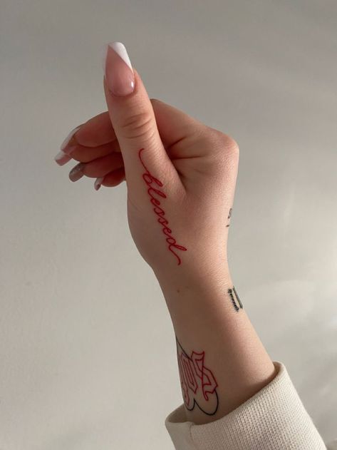 Little Hand Tattoos For Women, Red Ink Hand Tattoo, Hand Tattoos Red, Hands Tattoo For Women, Word Hand Tattoos, Red Hand Tattoo, Red Tattoo Aesthetic, Girly Hand Tattoos, Girly Aesthetics