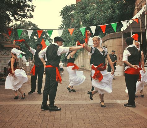 Another tradition is the Italian folk dance, as seen in the picture. For centuries, dances has been an integral part of Italian tradition and symbolize the continuous thread of Italian life. Three of the most popular dances are the Tarantella from Puglia, the Sardinian ballu tundu and the Neapolitan Saltarello. The tarantella is conducted to heal mythical tarantula bites, hence the similarity between the words. Italian folk dances are performed on special occasions such as a wedding. Italian Dance Traditional, Italian Culture Traditions, Italian Culture Aesthetic, Tarantella Dance, Italian Dance, Popular Dances, Mediterranean Culture, Dance Culture, Italy Culture