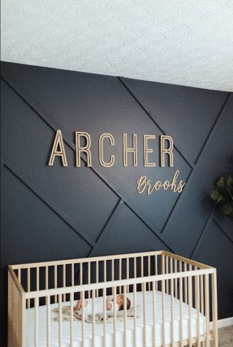 Wall Name Signs For Nursery, Names Signs For Nursery, Name On Bedroom Wall Ideas, Name On Accent Wall, Name Sign For Bedroom, Nursery Wood Slat Wall, Nursery Dark Green Accent Wall, Names On Wall Decor, Dark Grey Accent Wall Nursery