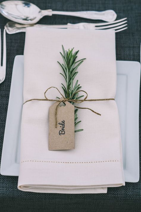 Rosemary accented wedding place name setting attached with DIY tag Wedding Name Tags, Place Card Table Wedding, Rustic Wedding Decorations, Wedding Place Names, Table Place Cards, Wedding Name, Wedding Table Decorations, Wedding Table Settings, Festival Wedding