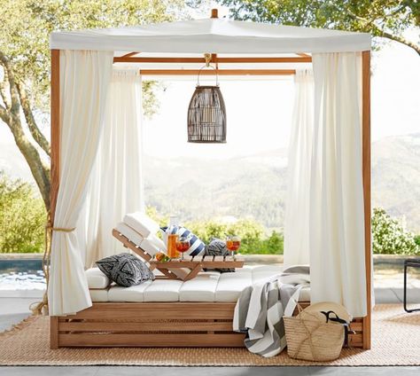 12 Patio Daybeds That Will Totally Make Your Summer | Give your yard the feel of an upscale cabana with this teak patio daybed—the pair of lounges are adjustable so you can recline as you wish, and the canopy helps keep you in the shade. #realsimple #outdoordecor #outdoorentertaining Daybed Canopy, Daybed Cushion, Double Chaise Lounge, Patio Daybed, Outdoor Daybed, Double Chaise, Outdoor Furniture Cushions, Canopy Bed, Outdoor Chaise